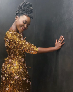 A closer look at Lupita Nyong’o’s stunning dress worth its weight in gold at the Oscars 2022. (townandcountrymag)